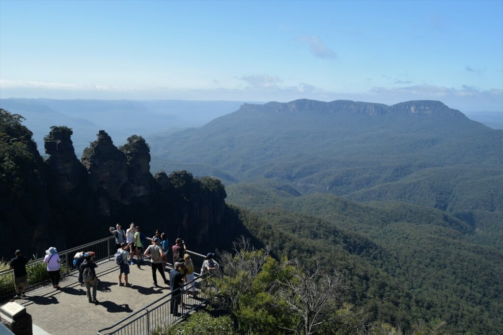 Family taking in the breathtaking view from the Blue Mountains Scenic Lookout